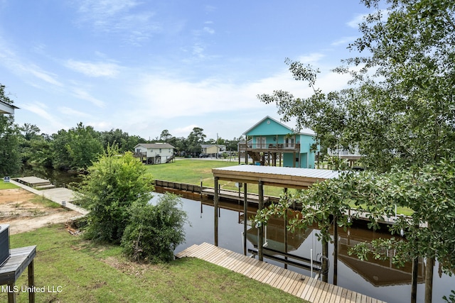 4113 Blue Jay St, Bay Saint Louis, MS 39520 - view of dock with a yard and a water view