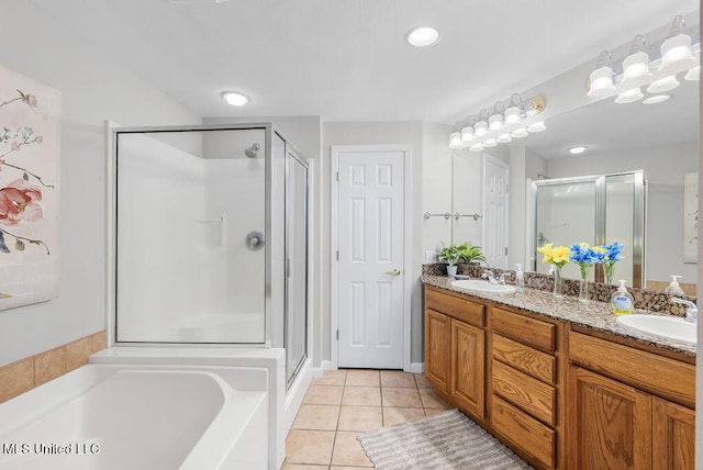 bathroom featuring vanity, separate shower and tub, and tile patterned flooring