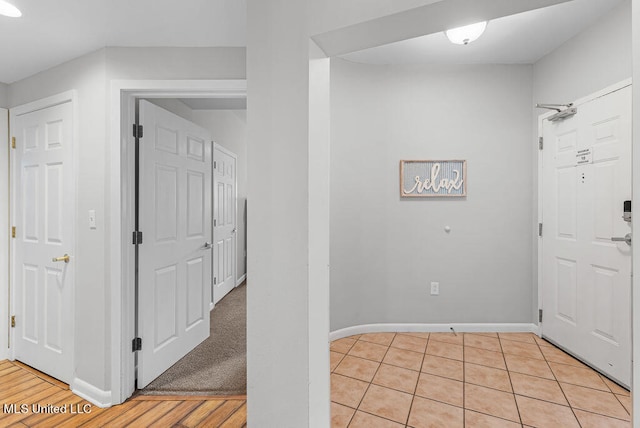 entrance foyer with light hardwood / wood-style flooring