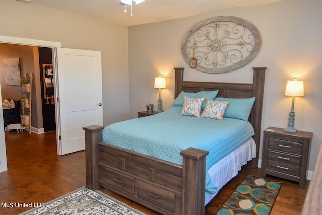 bedroom featuring dark hardwood / wood-style floors