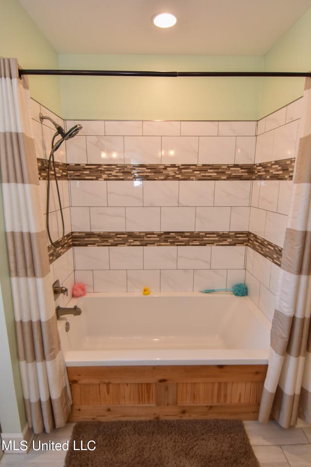 bathroom with shower / bath combination with curtain