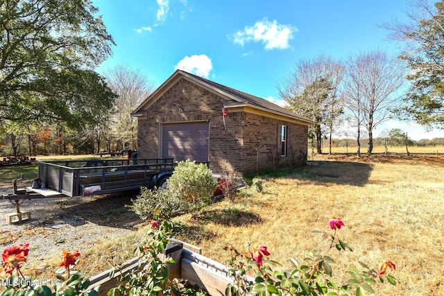 view of home's exterior with a lawn