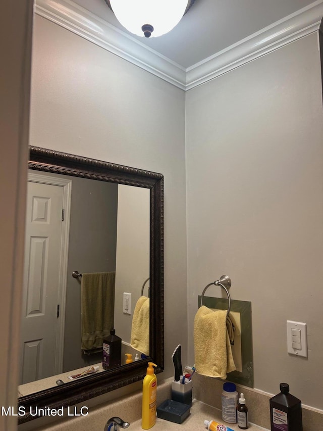 bathroom featuring ornamental molding