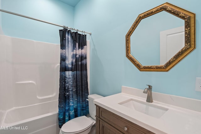 full bathroom with shower / tub combo with curtain, vanity, and toilet