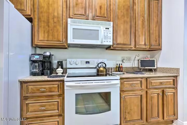 kitchen with white appliances