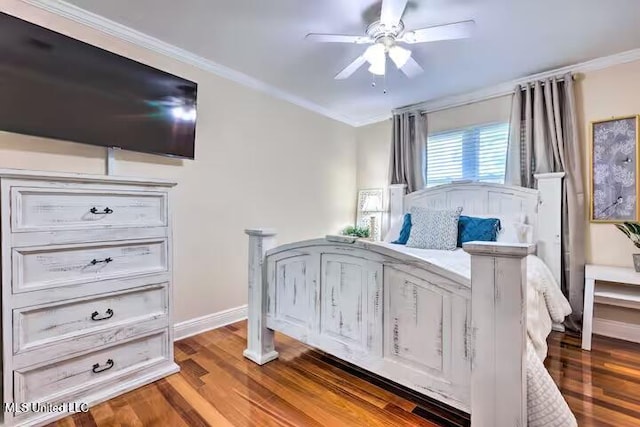 bedroom featuring ornamental molding, ceiling fan, and wood-type flooring