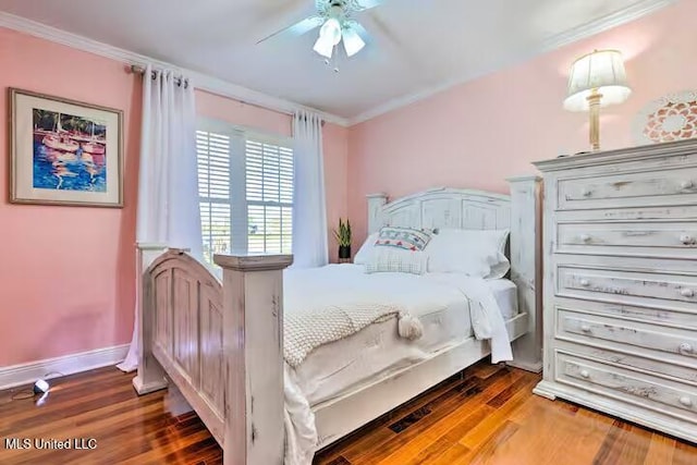 bedroom with crown molding, ceiling fan, and wood-type flooring