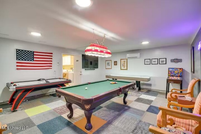 playroom featuring billiards, washing machine and dryer, and an AC wall unit