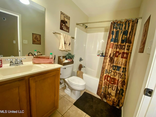 bathroom with tile patterned floors, shower / tub combo, toilet, and vanity