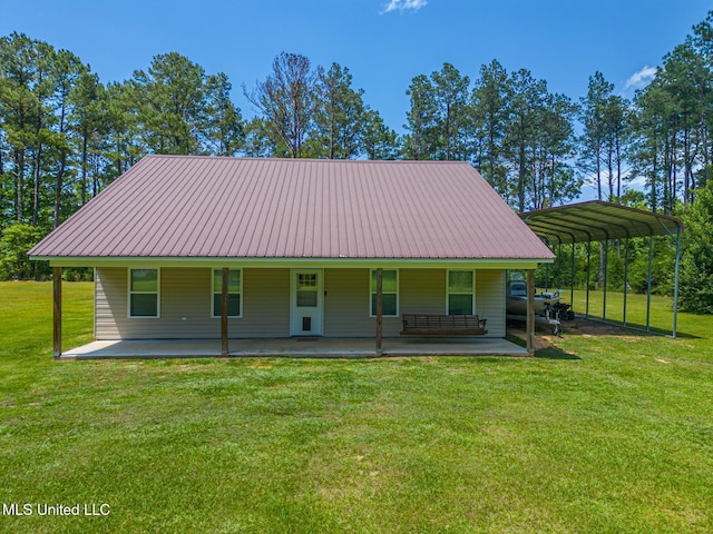 51 Decalb Oneal Rd, Perkinston, MS 39573 - country-style home featuring a carport, a front yard, metal roof, and a porch