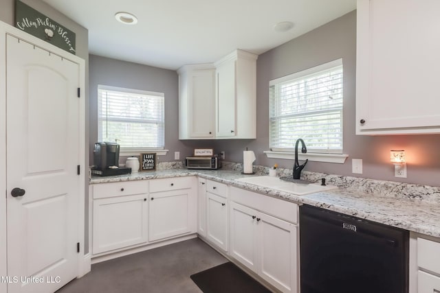 51 Decalb Oneal Rd, Perkinston, MS 39573 - kitchen with dishwasher, a sink, white cabinetry, and light stone countertops