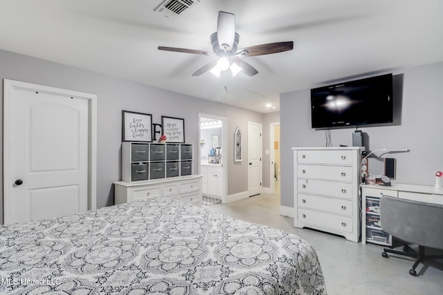 51 Decalb Oneal Rd, Perkinston, MS 39573 - bedroom with a desk, connected bathroom, a ceiling fan, and finished concrete floors