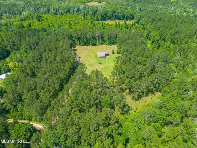 51 Decalb Oneal Rd, Perkinston, MS 39573 - aerial view of property and surrounding area featuring a heavily wooded area