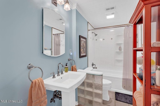 full bath with toilet, shower / tub combo, a sink, visible vents, and tile patterned floors