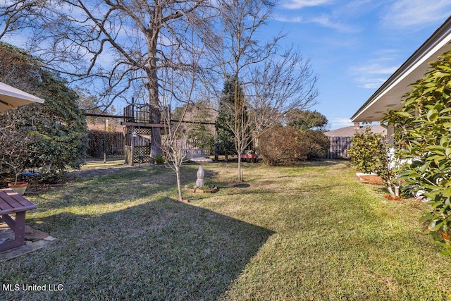 view of yard featuring fence