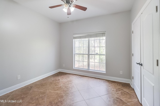 empty room featuring ceiling fan