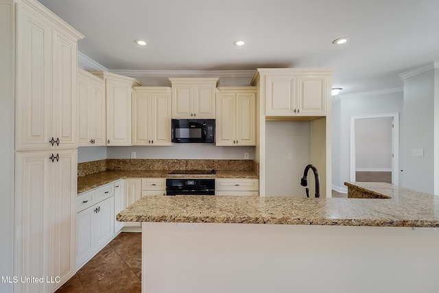 kitchen with light stone countertops, crown molding, black appliances, and cream cabinetry