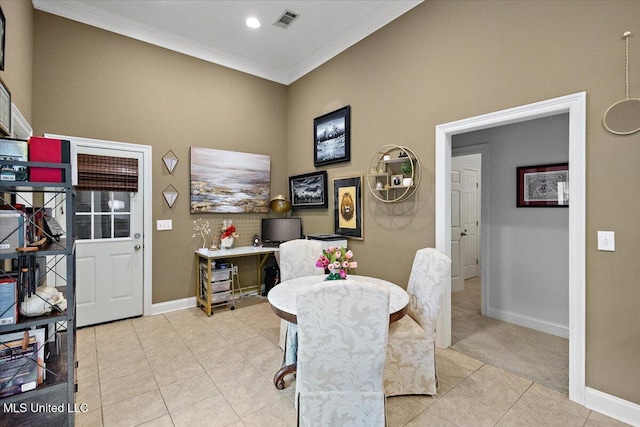 tiled dining space with ornamental molding