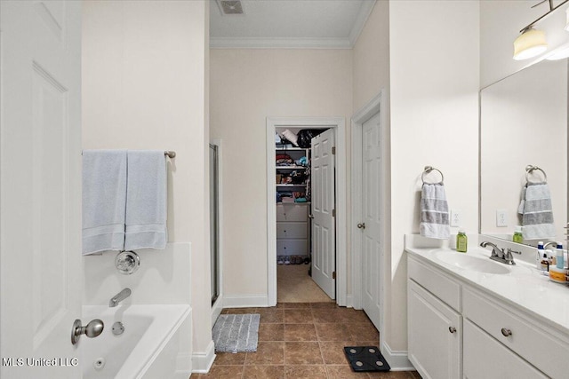 bathroom featuring tile patterned floors, ornamental molding, plus walk in shower, and vanity