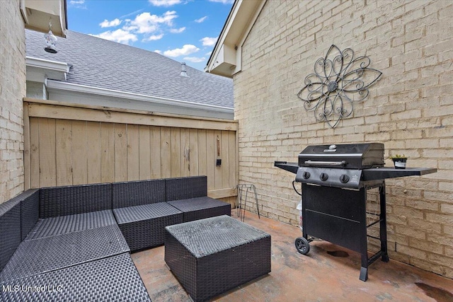 view of patio / terrace with an outdoor living space and grilling area