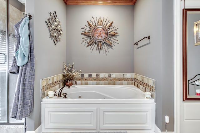 bathroom featuring a jetted tub