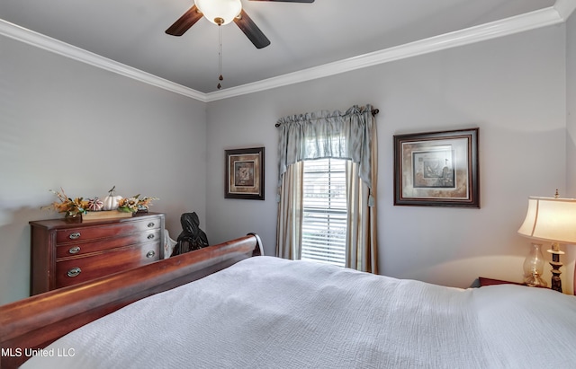 bedroom featuring a ceiling fan and ornamental molding