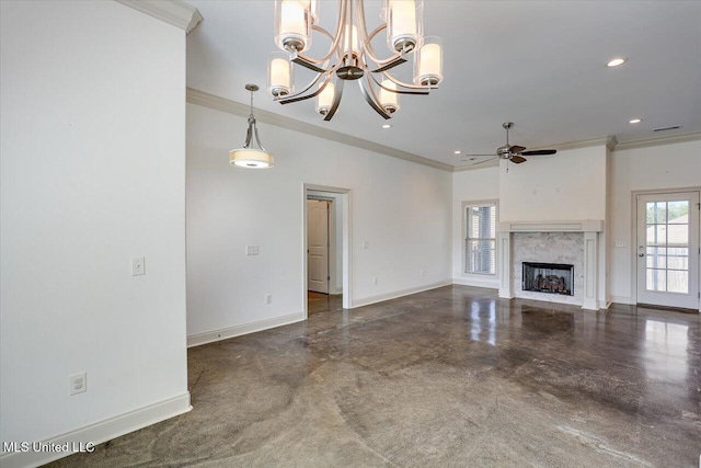 unfurnished living room featuring baseboards, ornamental molding, and ceiling fan with notable chandelier