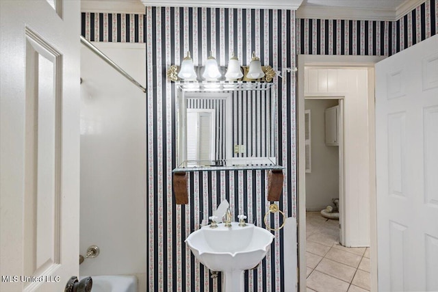 bathroom featuring tile patterned flooring and ornamental molding