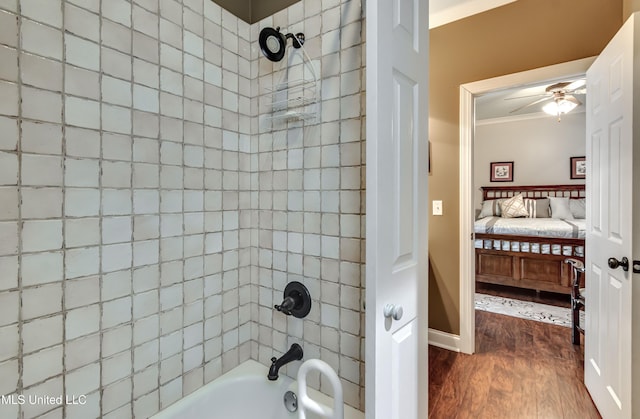 856 Wellington Way, Madison, MS 39110 - full bath featuring wood finished floors, connected bathroom, tub / shower combination, crown molding, and ceiling fan