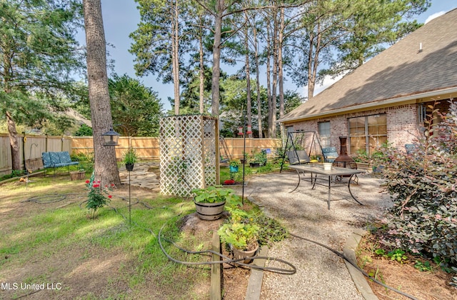 856 Wellington Way, Madison, MS 39110 - fenced backyard with a patio area