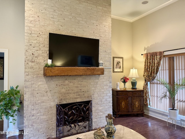 856 Wellington Way, Madison, MS 39110 - living area with wood finished floors, a fireplace, crown molding, and baseboards