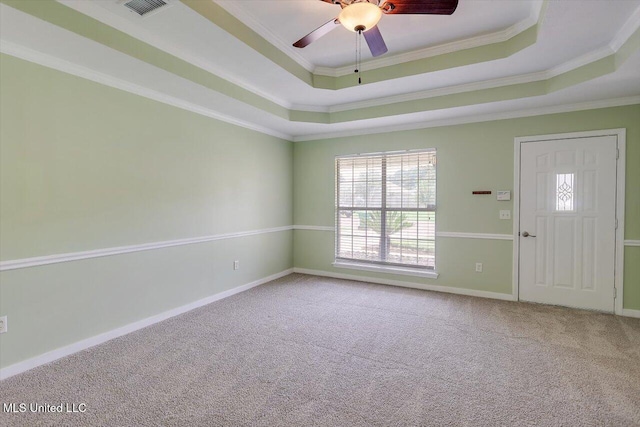 4328 Blaine Cir, Byram, MS 39272 - empty room with carpet flooring, a raised ceiling, ornamental molding, and ceiling fan