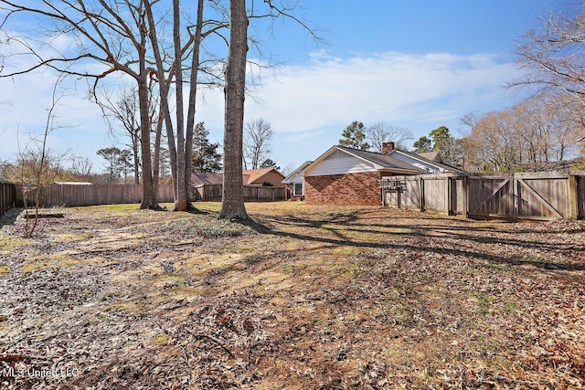 view of yard featuring fence