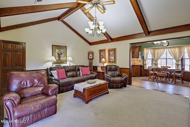 tiled living area with carpet, a wainscoted wall, beamed ceiling, and an inviting chandelier