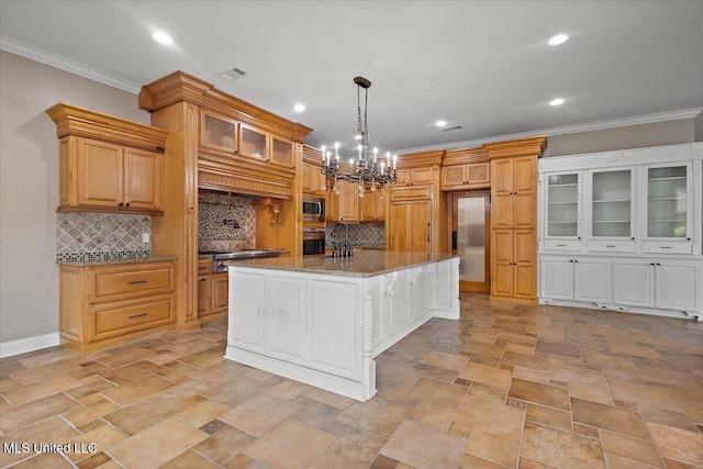 12025 Springridge Rd, Terry, MS 39170 - kitchen with stainless steel appliances, ornamental molding, a chandelier, tasteful backsplash, and recessed lighting