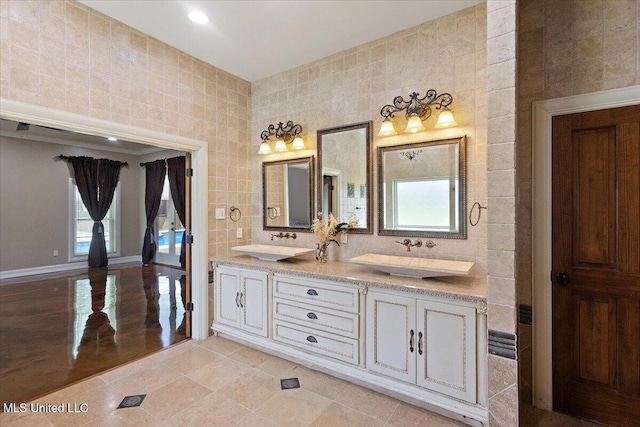 12025 Springridge Rd, Terry, MS 39170 - bathroom with double vanity, plenty of natural light, tile walls, recessed lighting, and tile patterned flooring