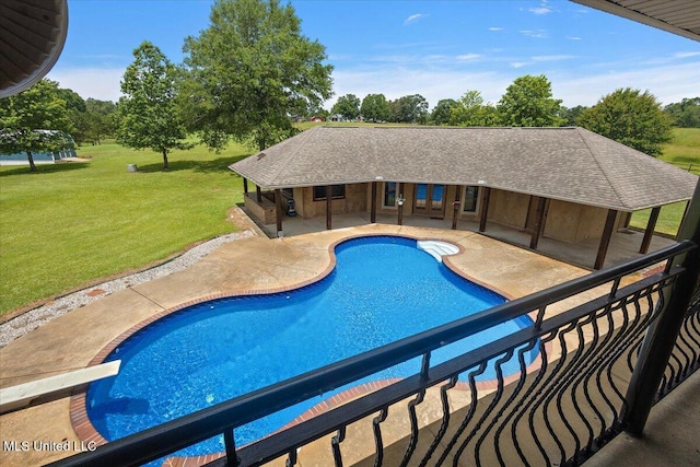 12025 Springridge Rd, Terry, MS 39170 - swimming pool featuring a yard, a patio area, french doors, a diving board, and view of wooded area