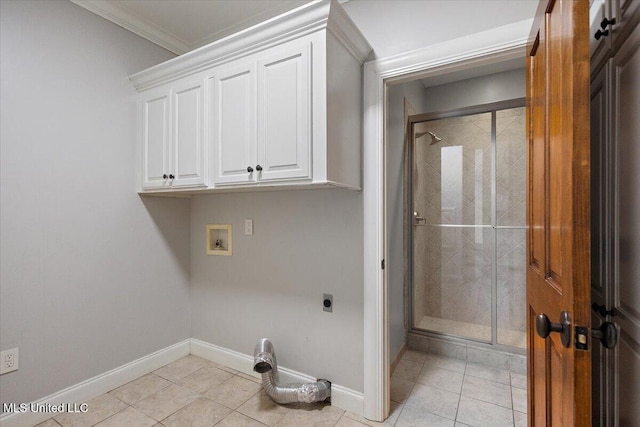 12025 Springridge Rd, Terry, MS 39170 - laundry room featuring electric dryer hookup, washer hookup, light tile patterned floors, crown molding, and cabinet space