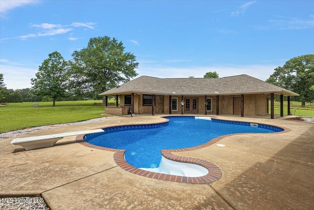 12025 Springridge Rd, Terry, MS 39170 - swimming pool with a patio area, a lawn, a diving board, and french doors