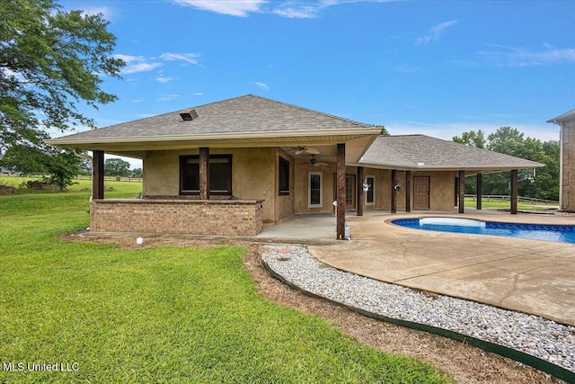 12025 Springridge Rd, Terry, MS 39170 - swimming pool featuring a patio, a ceiling fan, and a yard