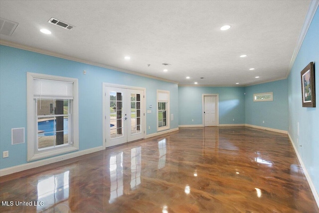 12025 Springridge Rd, Terry, MS 39170 - spare room featuring crown molding, french doors, recessed lighting, wood finished floors, and a textured ceiling