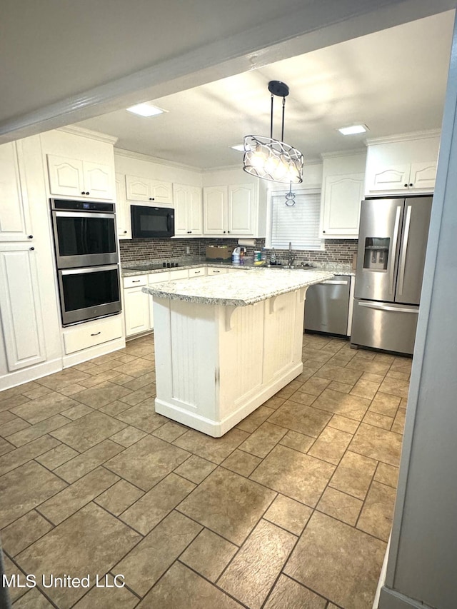 kitchen with white cabinets, a kitchen island, black appliances, pendant lighting, and light stone counters