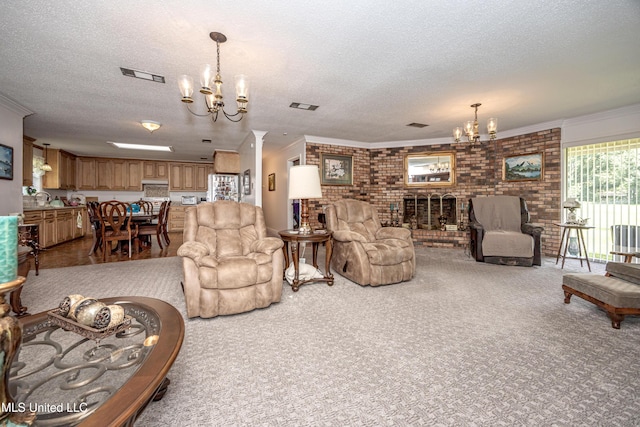10001 Echo Glen Dr, Moss Point, MS 39562 - carpeted living area with a chandelier, ornamental molding, a textured ceiling, brick wall, and a brick fireplace