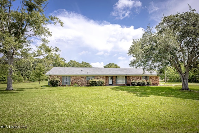 10001 Echo Glen Dr, Moss Point, MS 39562 - ranch-style house featuring a front yard and brick siding