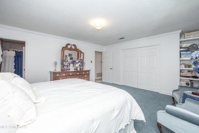 10001 Echo Glen Dr, Moss Point, MS 39562 - carpeted bedroom with a closet, crown molding, and a textured ceiling