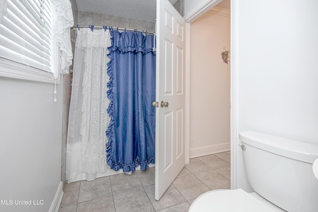 10001 Echo Glen Dr, Moss Point, MS 39562 - full bathroom with tile patterned flooring and a shower with curtain