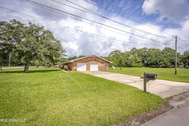 10001 Echo Glen Dr, Moss Point, MS 39562 - view of front of house with a front lawn, a garage, and concrete driveway