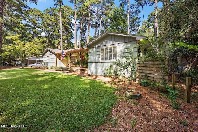 exterior space with a lawn