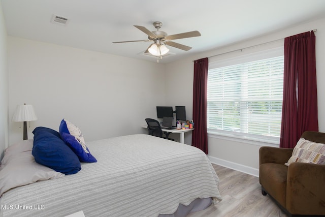13 High Hills Dr, Hattiesburg, MS 39402 - bedroom featuring light wood-style floors, baseboards, and a ceiling fan