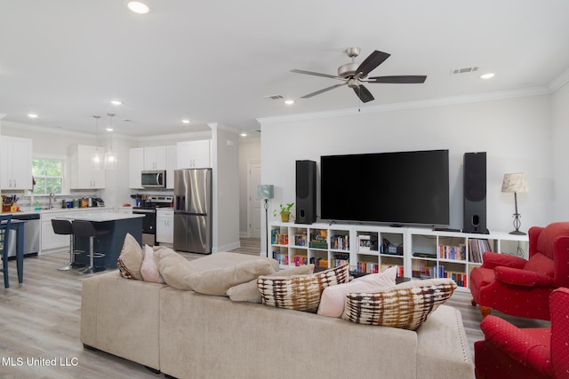 13 High Hills Dr, Hattiesburg, MS 39402 - living area featuring ornamental molding, ceiling fan, light wood finished floors, and recessed lighting